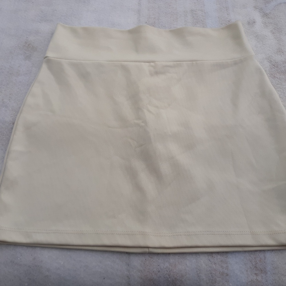 Bebe Cream Mini Skirt
